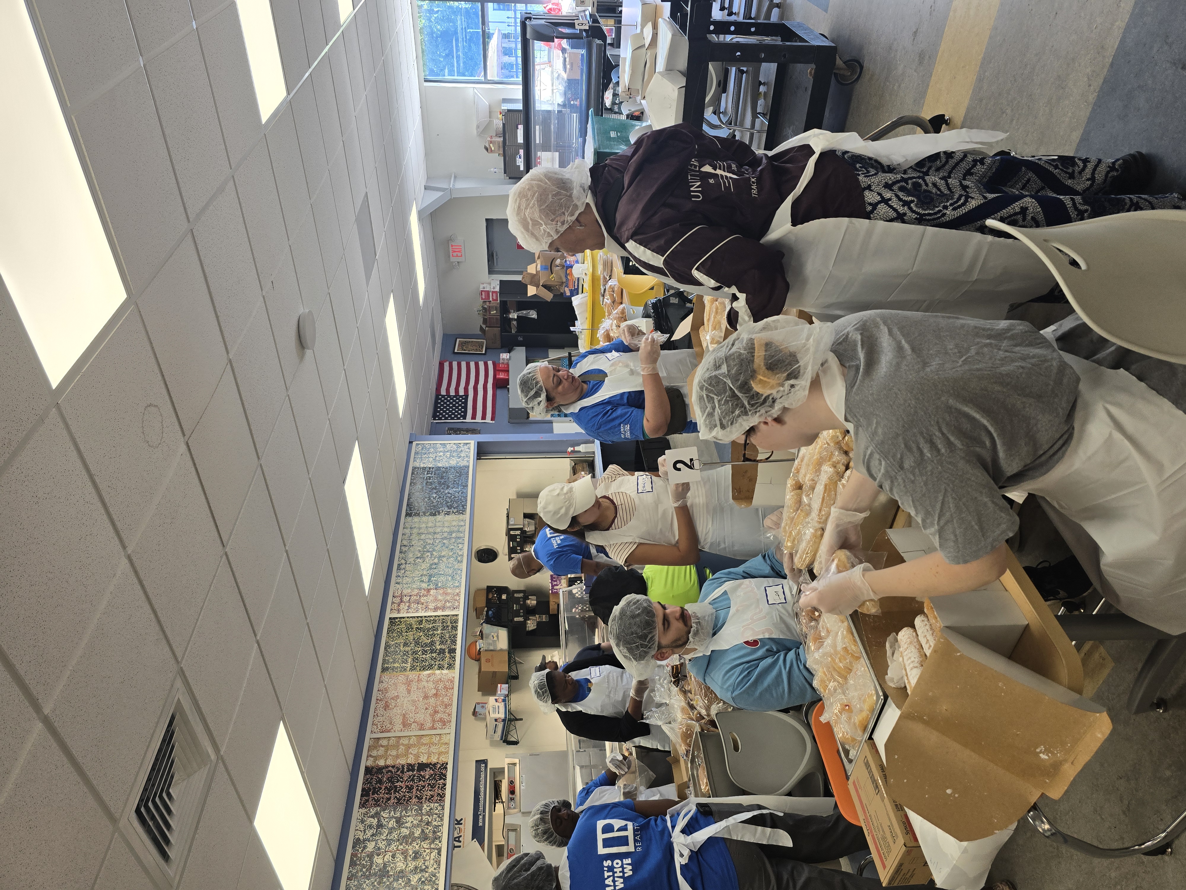 Volunteers serving at TASK kitchen